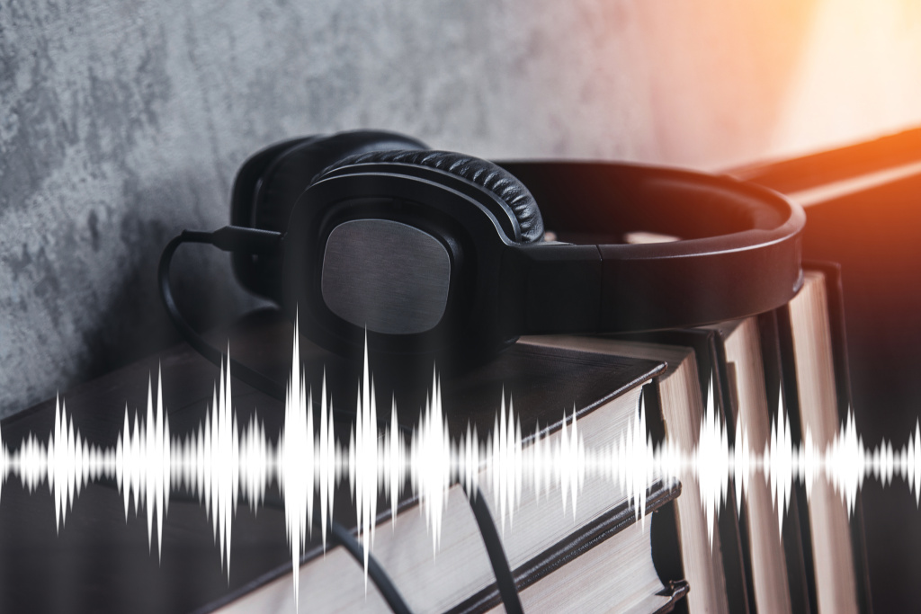 real-books-headphones-sound-waveform-audiobook-listening.jpg